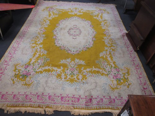 Lot 692 - A modern mustard ground rug approx 390 x 261cm
