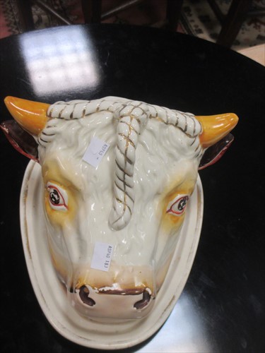 Lot 82 - Calf head pottery cheese dish and cover