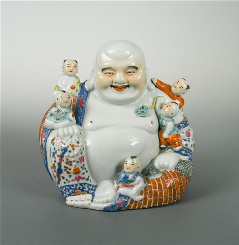 Lot 265 - A Chinese Buddha porcelain figure with little...