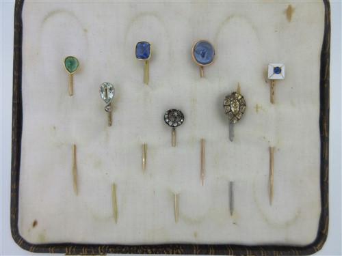 Lot 227 - A star sapphire stick pin and six others set with jewels