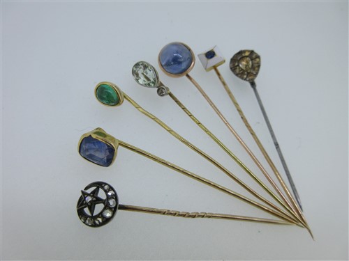 Lot 227 - A star sapphire stick pin and six others set with jewels