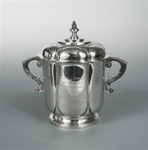 Lot 672 - A George V silver large two handled porringer & cover, a gift from the Duke of Connaught