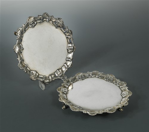 Lot 587 - A pair of George III silver waiters by Ebenezer Coker
