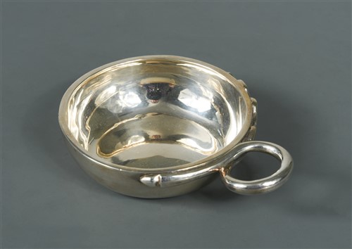 Lot 674 - A George V silver tastevin by Tessier