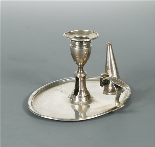 Lot 590 - A George III silver chamberstick and snuffer