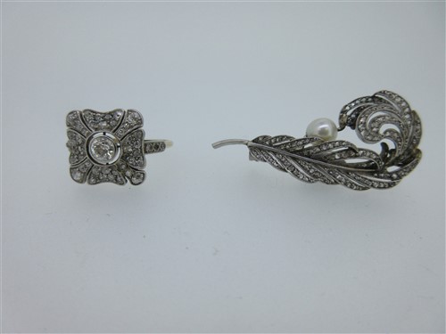 Lot 222 - A diamond and pearl feather brooch and similar period diamond cluster ring
