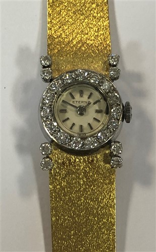 Lot 474 - Eterna - A Swiss 18ct gold lady's diamond set wristwatch