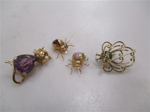 Lot 207 - A quartet of stone set animal brooches