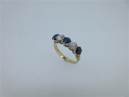Lot 197 - An Edwardian sapphire and diamond five stone ring