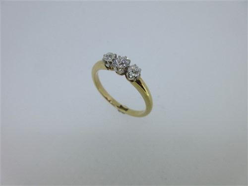 Lot 134 - A diamond three stone ring