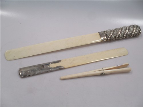Lot 238 - Two silver handled ivory page turners