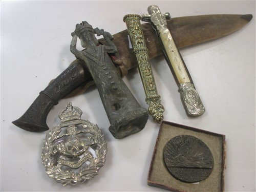 Lot 130 - A 19th century white metal folding knife