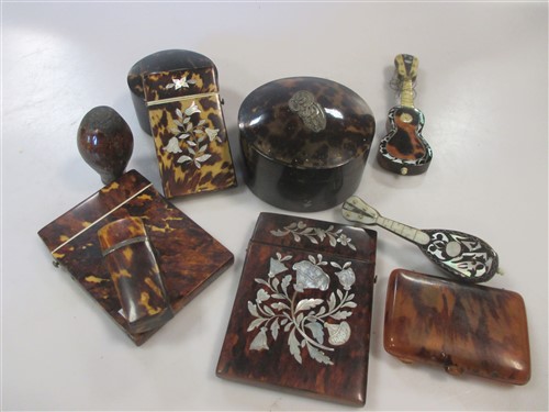Lot 119 - A 19th century tortoiseshell and mother of pearl inlayed card case