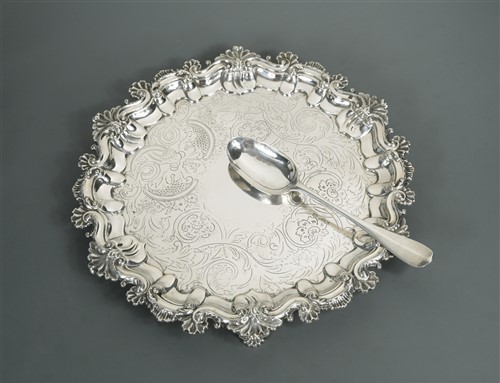 Lot 695 - Glasgow - A William IV silver salver together with an 18th century silver table spoon