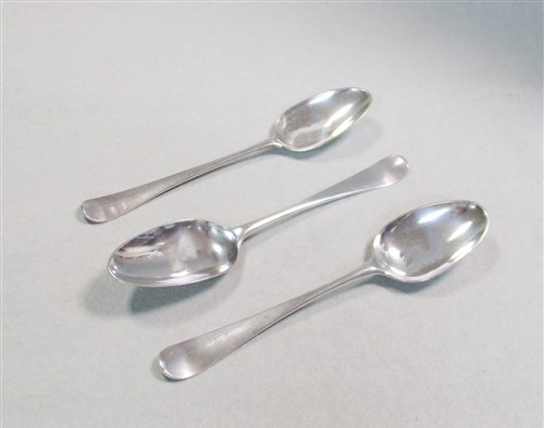 Lot 593 - Three early George III silver tablespoons