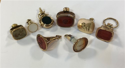 Lot 457 - A collection of 8 watch fobs