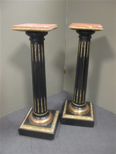 Lot 403 - A pair of late 19th century ebonised columns...