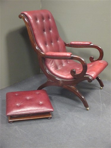 Lot 438 - A George IV mahogany library arm chair...