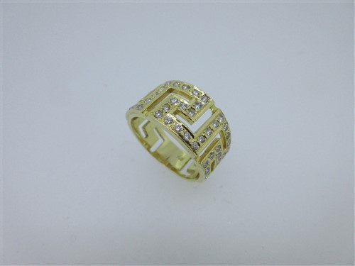 Lot 68 - A Greek key pattern band ring set with diamonds