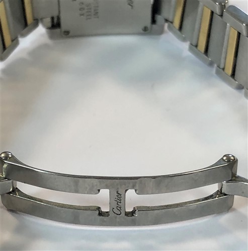 Lot 475 - Cartier - A lady's bi-metal Tank Francaise wristwatch