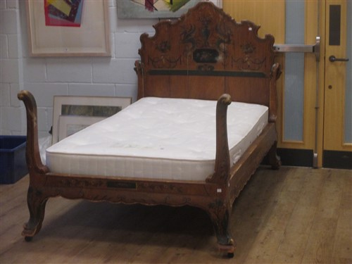 Lot 480 - A George III painted queen sized bed