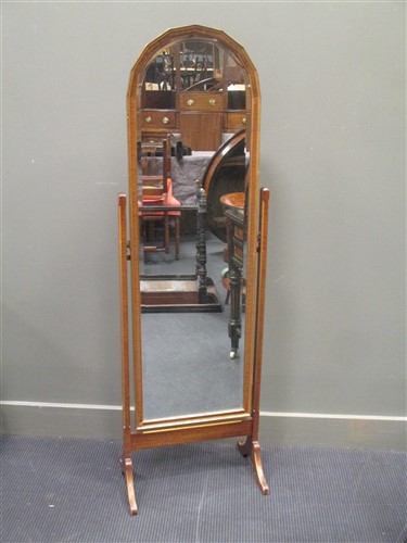 Lot 458 - A mahogany and gilt cheval mirror
