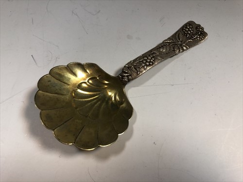 Lot 236 - An American metalwares conserve spoon by Tiffany