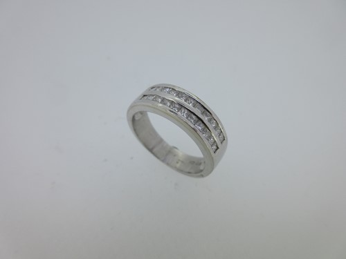 Lot 45 - A diamond set band ring