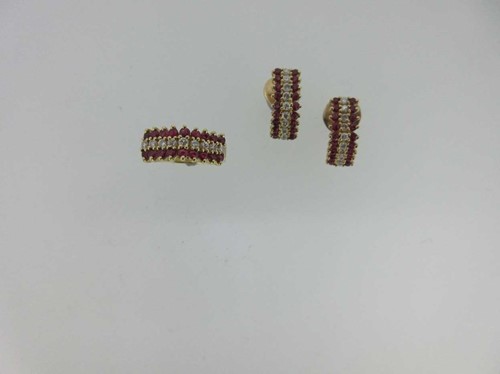 Lot 238 - A ruby and diamond ring and earring suite