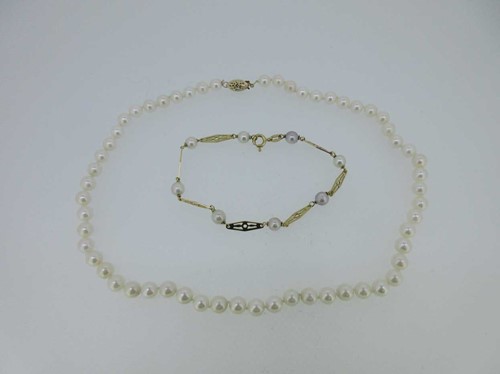 Lot 200 - A 14ct gold and cultured pearl bracelet and a string of uniform cultured pearls