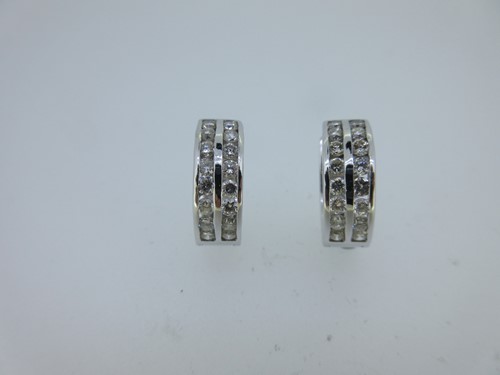 Lot 44 - A pair of diamond ear hoops
