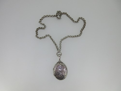 Lot 196 - A Victorian silver locket and chain