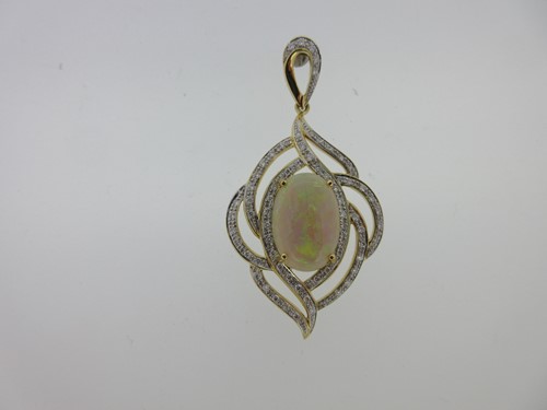 Lot 211 - A contemporary opal, diamond and 18ct gold pendant
