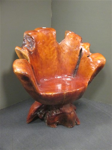 Lot 417 - A solid root-form wooden one piece swivel desk...