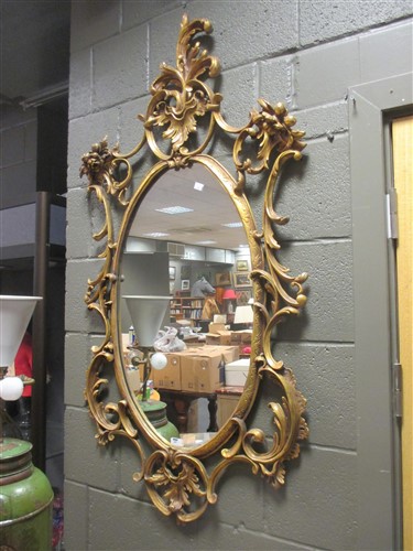 Lot 389 - A pair of 18th century style rococo wall...