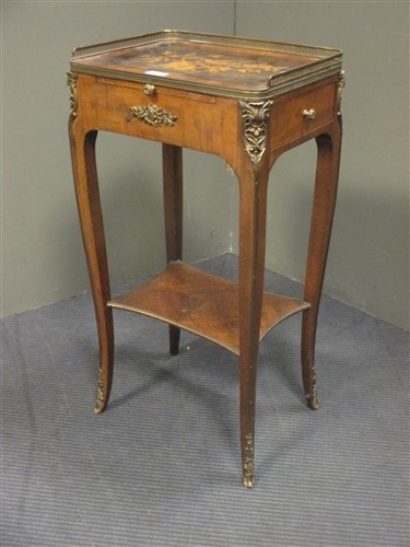 Lot 401 - A French mahogany and inlaid table a ecrit,...