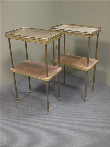 Lot 384 - A pair of brass gallery side tables, both 67 x...