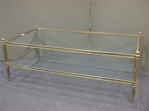 Lot 475 - A rectangular brass frame and glass coffee...