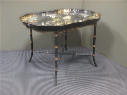 Lot 468 - A modern lacquer tray top occasional table