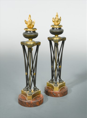 Lot 243 - A pair of French late 18th or early 19th century Directoire marble, patinated and gilt bronze candlesticks