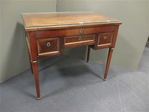 Lot 410 - A 19th century French mahogany desk, of three...