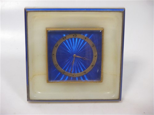 Lot 12 - An Art Deco alabaster and blue enamel timepiece