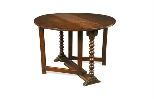 Lot 287 - A Charles II and later walnut drop leaf table 