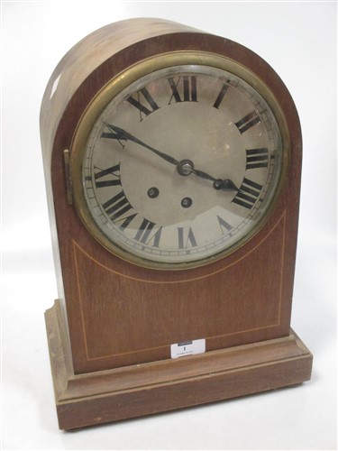 Lot 1 - A mahogany dome top chiming clock