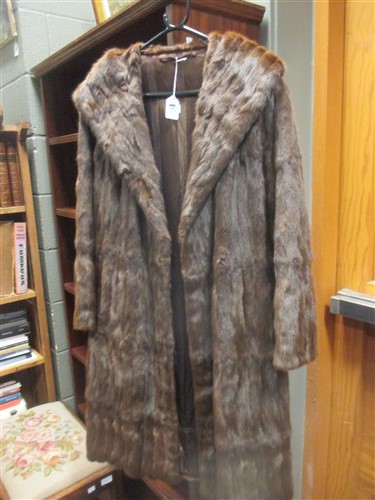 Lot 146 - A ladies dark brown fur coat size 16/18,...