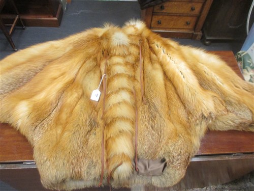 Lot 144 - A lady's fur jacket size 14, together with a...