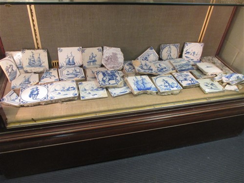 Lot 31 - A collection of Delft type tiles, some...