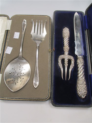 Lot 271 - A silver handled bread knife and matching...