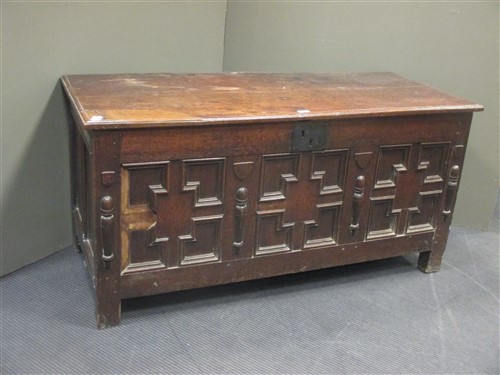 Lot 416 - An 18th century oak coffer with geometric...