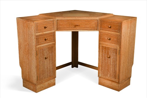 Lot 178 - Heal's, a limed oak corner pedestal desk